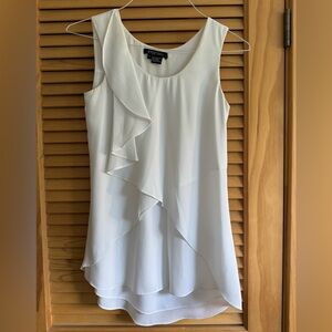 White ruffle sleveless top